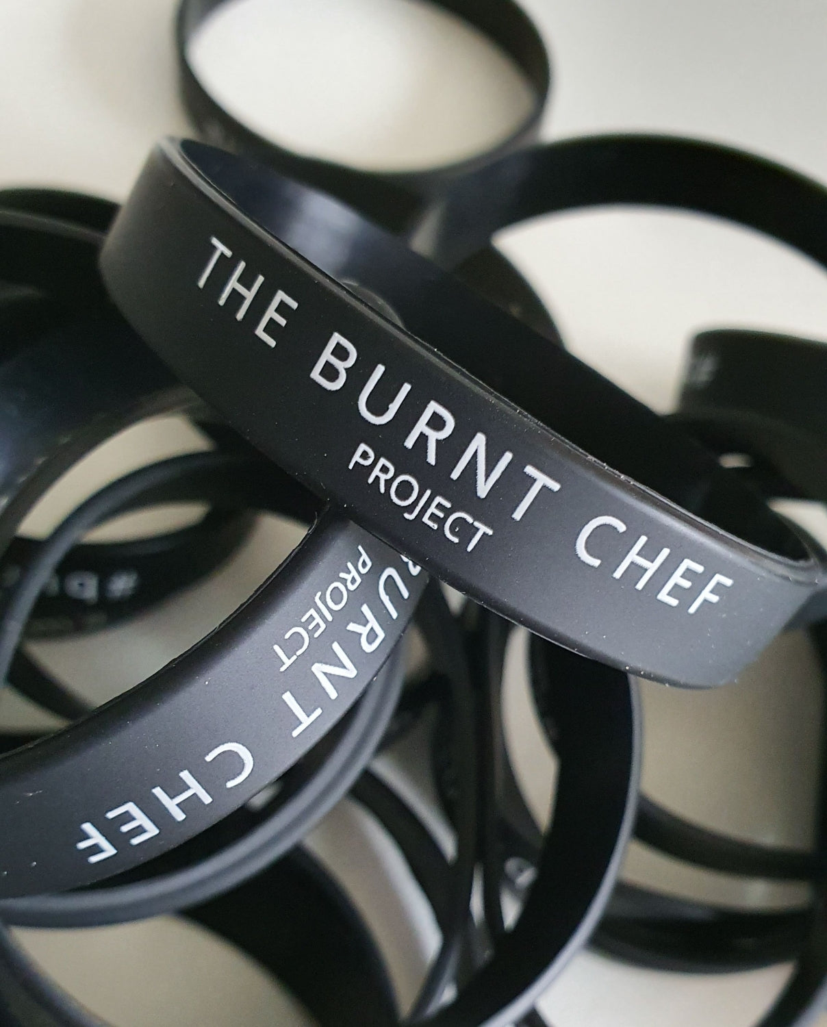 The Burnt Chef Wristband (White/Black)