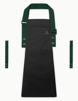 Black Swap & Pop apron with Bottle Green straps, left chest logo