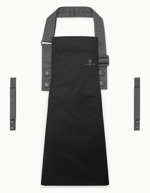 Black Swap & Pop apron with Dark Grey straps, left chest logo