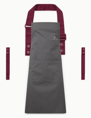 Dark Grey Swap & Pop apron with Burgundy straps, left chest logo