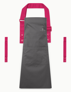 Dark Grey Swap & Pop apron with Hot Pink straps, left chest logo