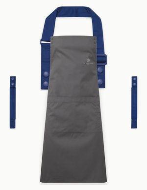 Dark Grey Swap & Pop apron with Royal Blue straps, left chest logo